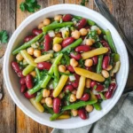 Colorful Three Bean Salad in a rustic bowl